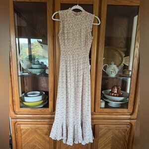 Doen flowy floral sleeveless midi dress with high neck & ruffled hems